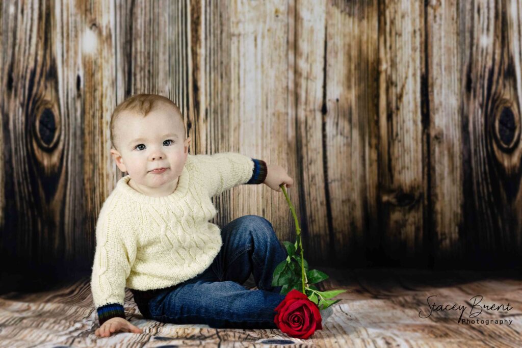 Toddler-Kid with Rose in Studio. Stacey Brent Photography, Central Newfoundland.