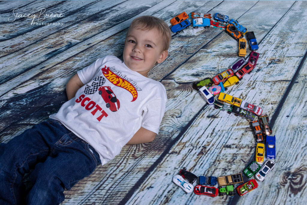 Birthday Third in studio with vehicles in 3. Stacey Brent Photography, Central Newfoundland.