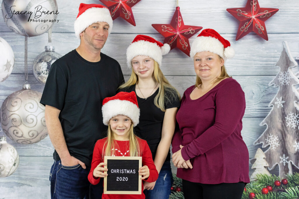 Christmas Photo in Studio with Santa Hats. Stacey Brent Photography, Central Newfoundland.