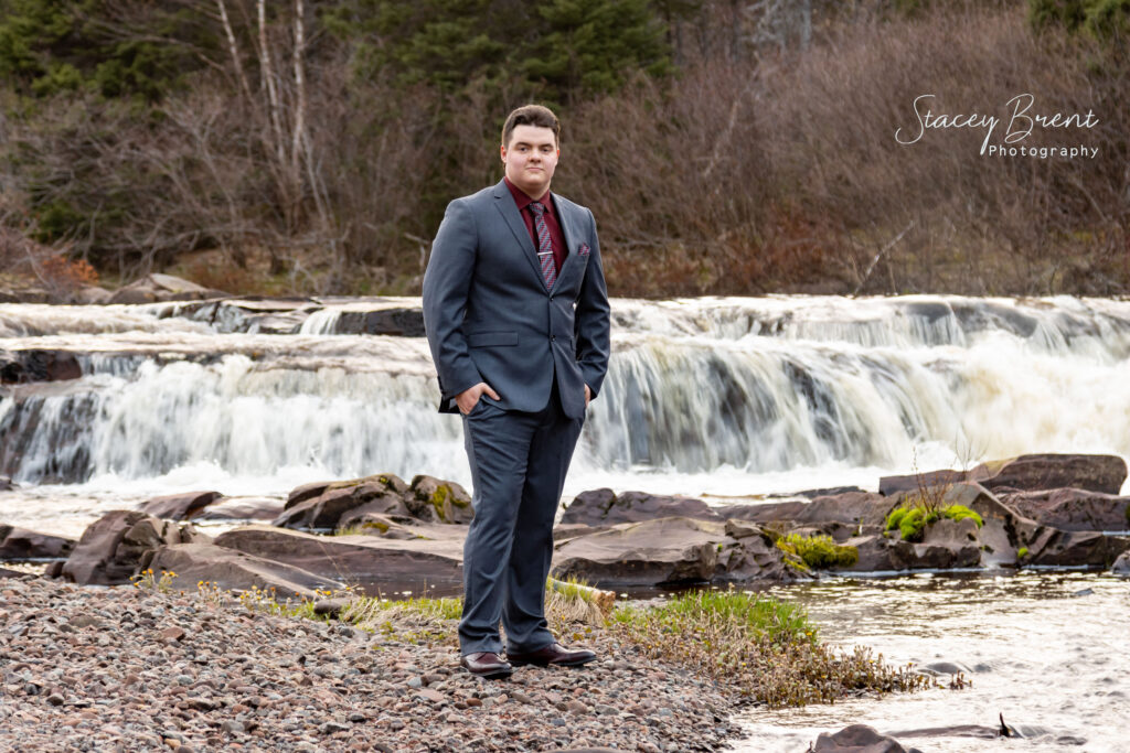 Senior Graduate of Botwood next to the river falls. Stacey Brent Photography, Central Newfoundland.