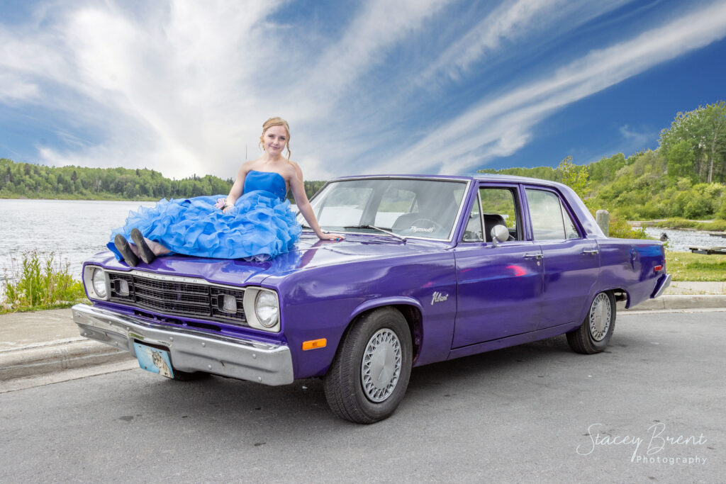 Senior Graduate with her car. Stacey Brent Photography, Central Newfoundland.