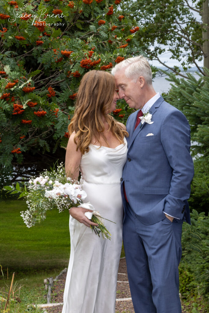 Wedding of bride and groom beautiful pose. Stacey Brent Photography, Central Newfoundland.